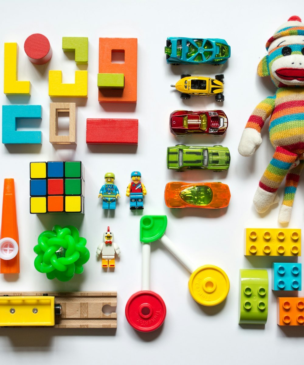 Colourful toys and games laid out in a play area