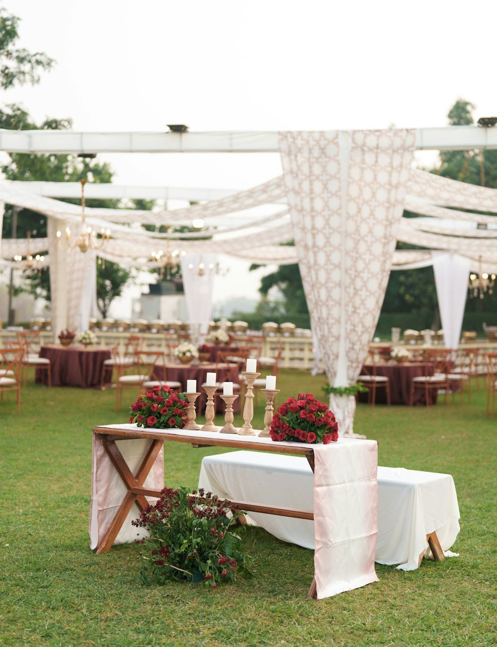 Garden reception with draped canopies